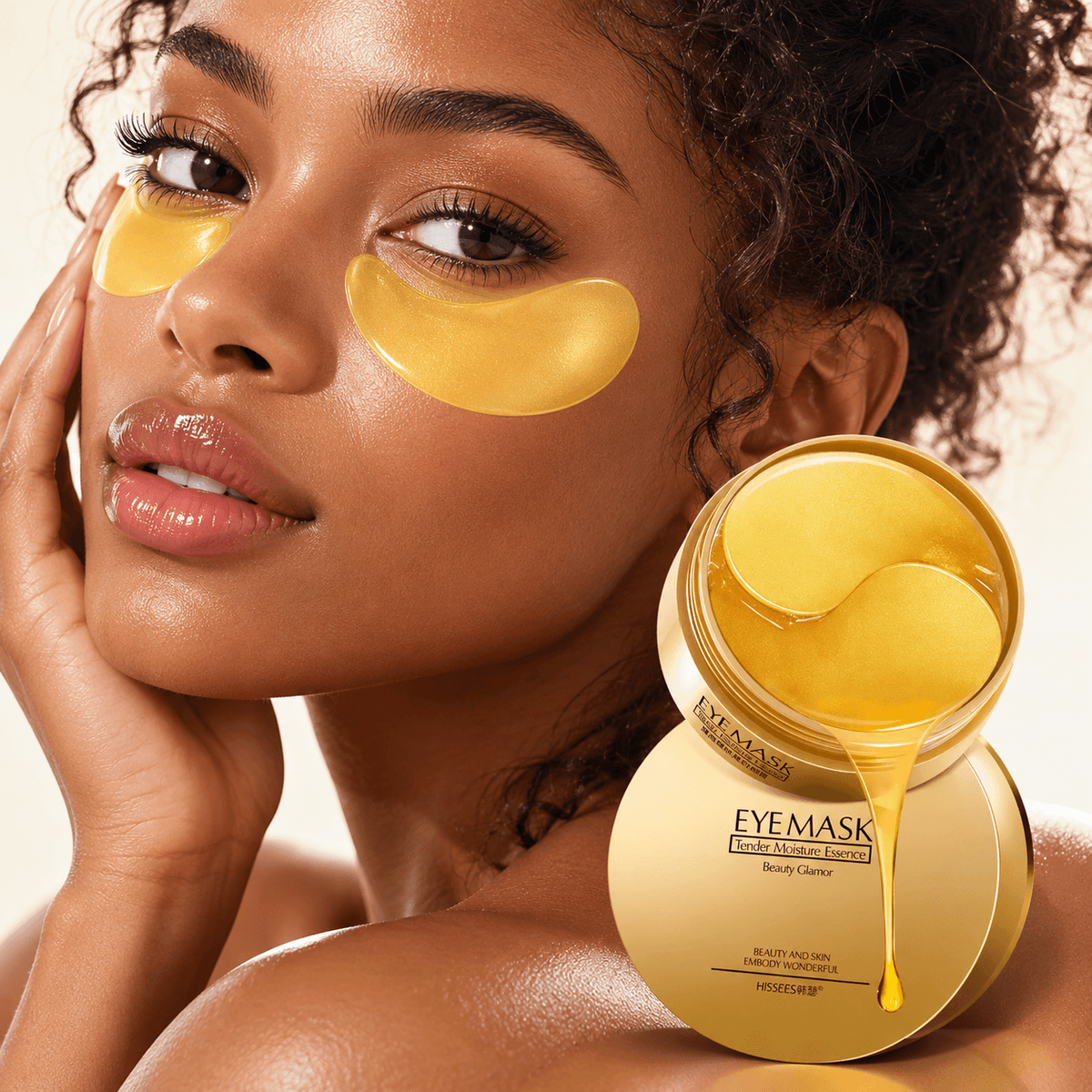 Woman using 24K Gold Eye Mask with golden patches under her eyes for a refreshing skincare routine.