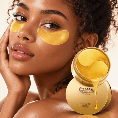 Woman using 24K Gold Eye Mask with golden patches under her eyes for a refreshing skincare routine.