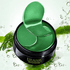 24K Gold Eye Mask in a round container with green eye patches ready for use.