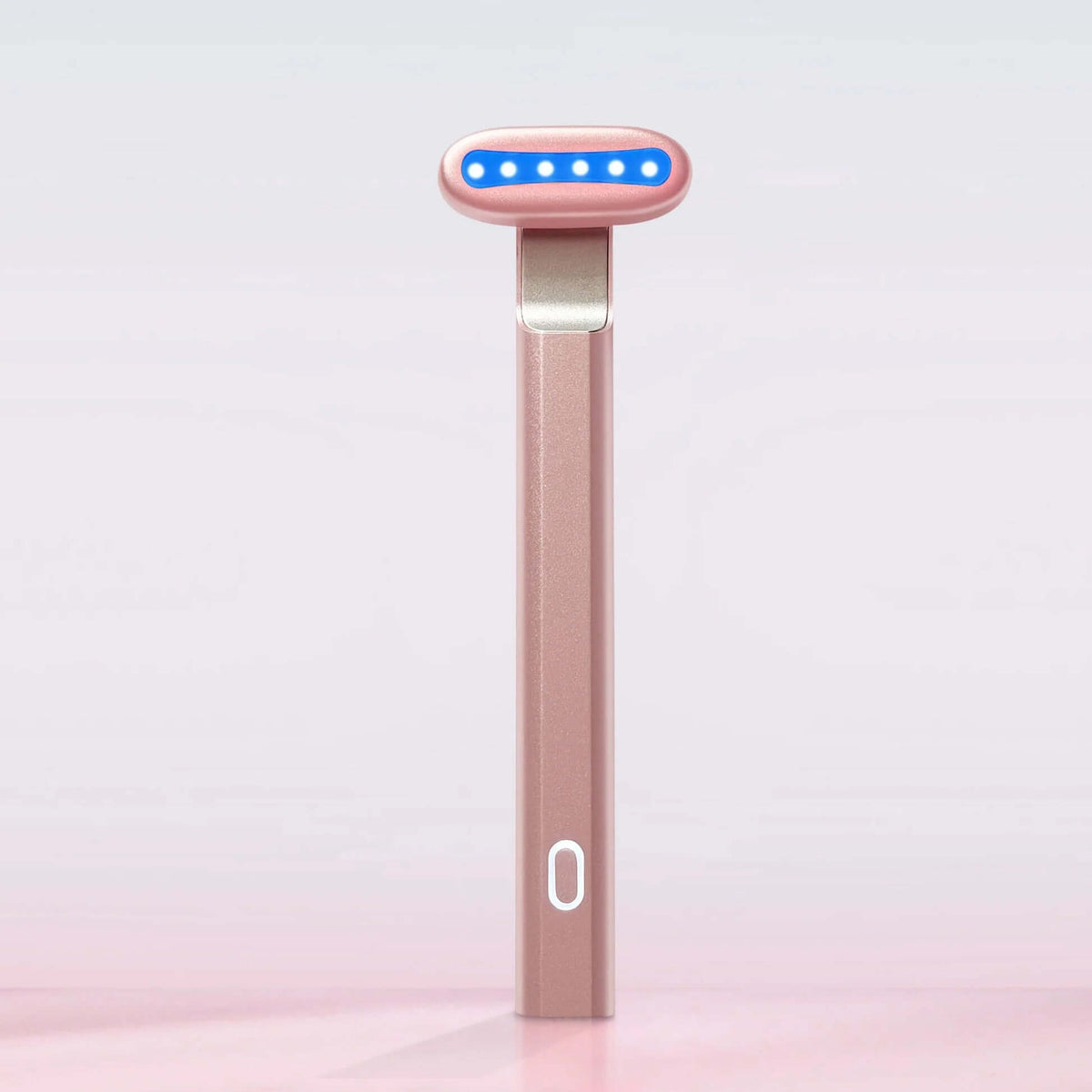 4-in-1 eye wand for skincare in rose gold with blue LED lights for eye treatment